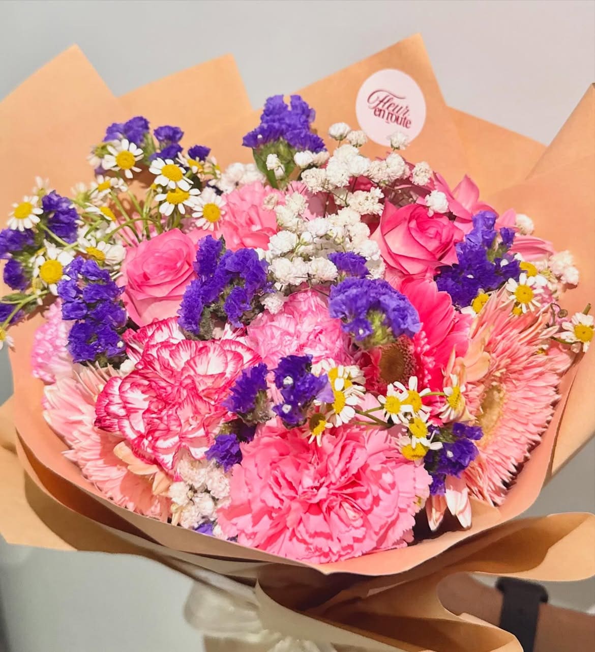 Close-up of a Thumbelina-style bouquet with two-toned carnations